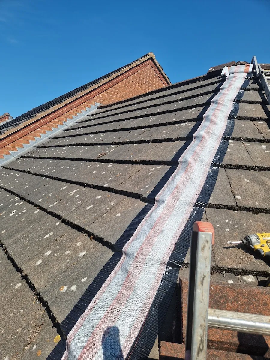 Felt and batten roof repair in progress